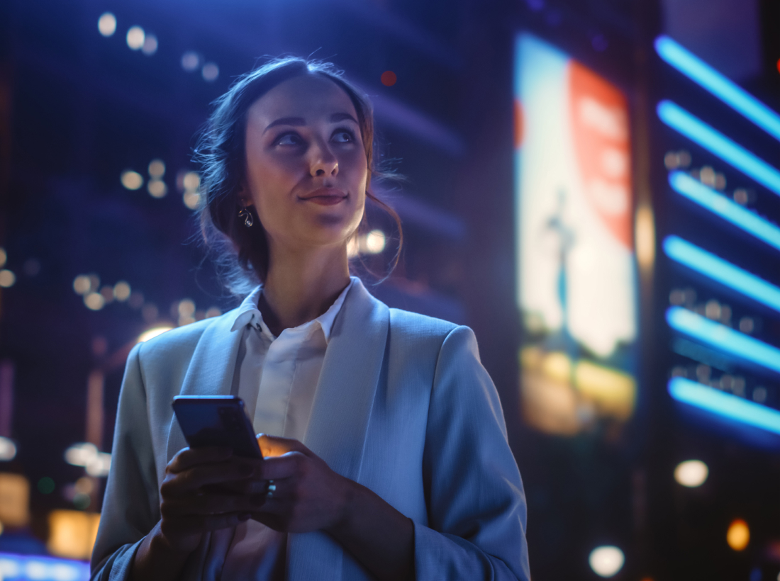 Woman on phone in city
