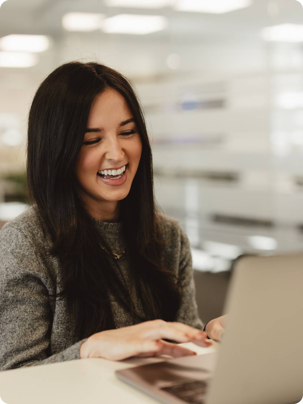 Onecom employee on laptop