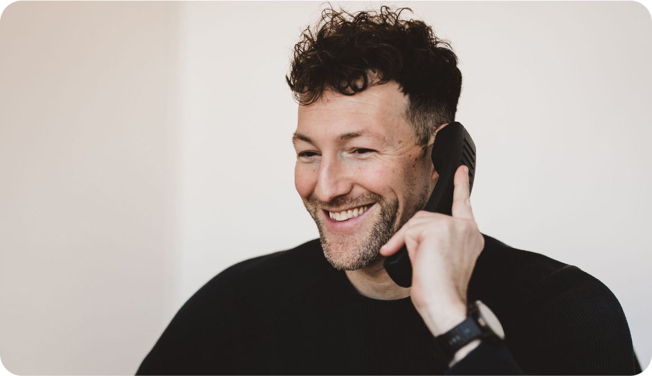 Onecom employee using landline phone